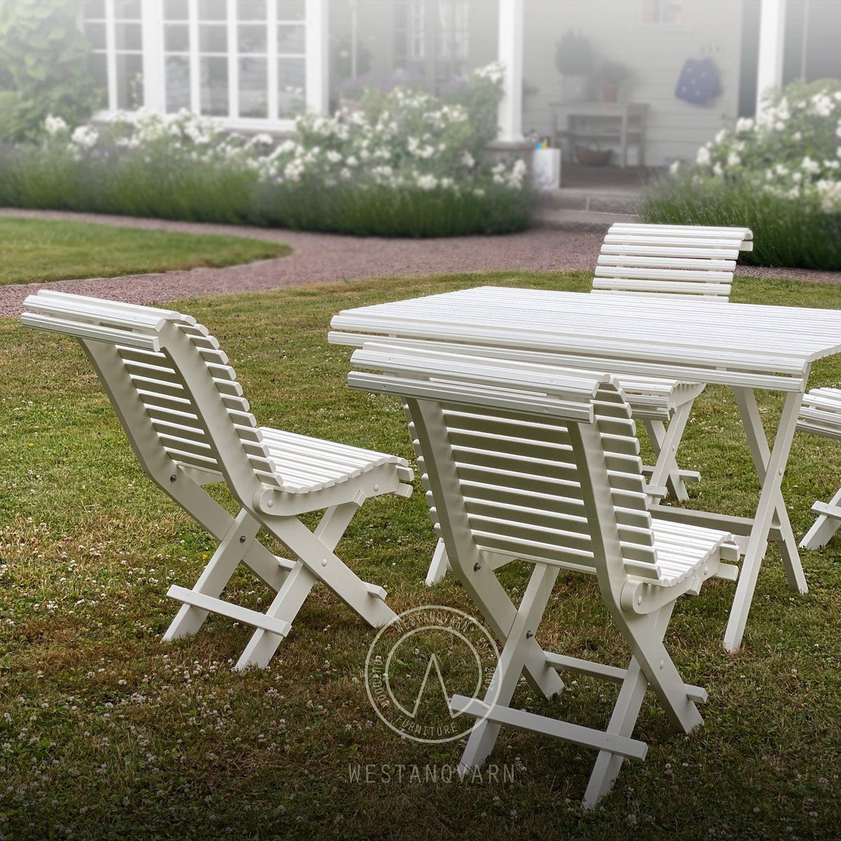 White Sundborn garden furniture, wooden table and seating